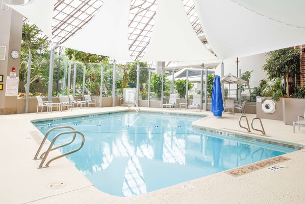 Indoor pool, open 7:00 AM to 10:00 PM, pool loungers