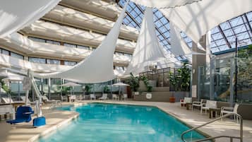 Indoor pool, open 7:00 AM to 10:00 PM, sun loungers