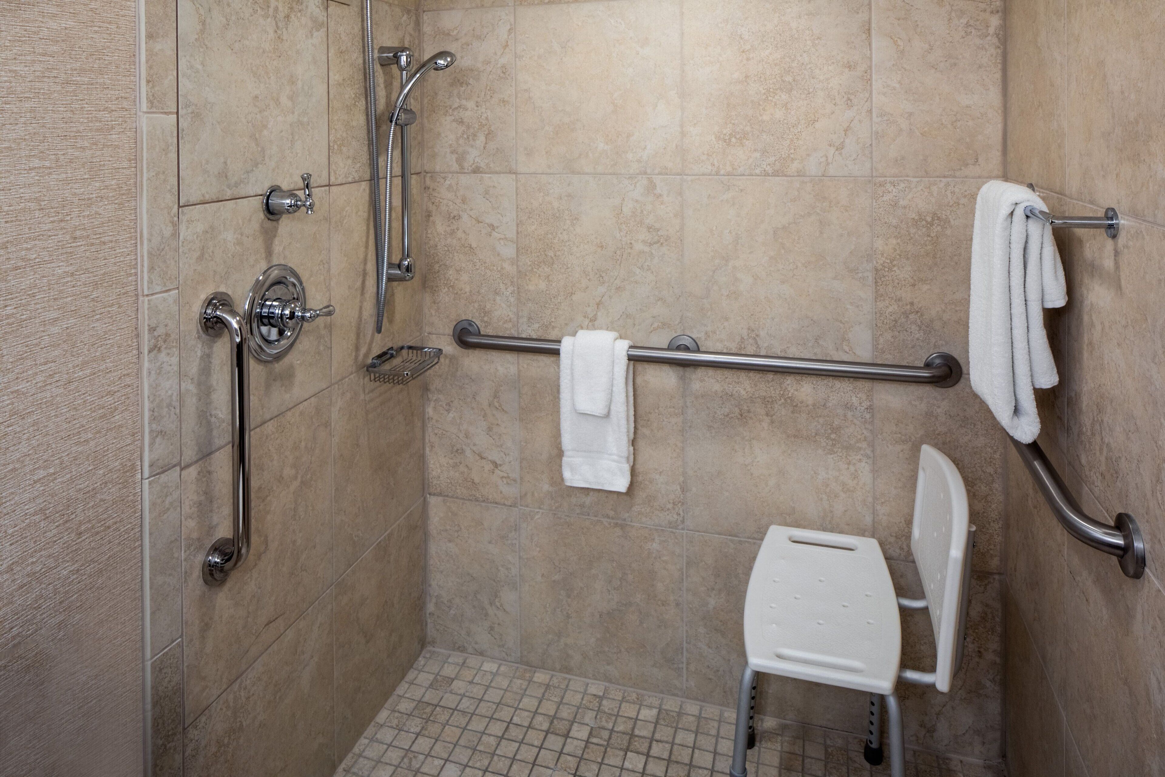 combined shower/bathtub, free toiletries, hair dryer, towels