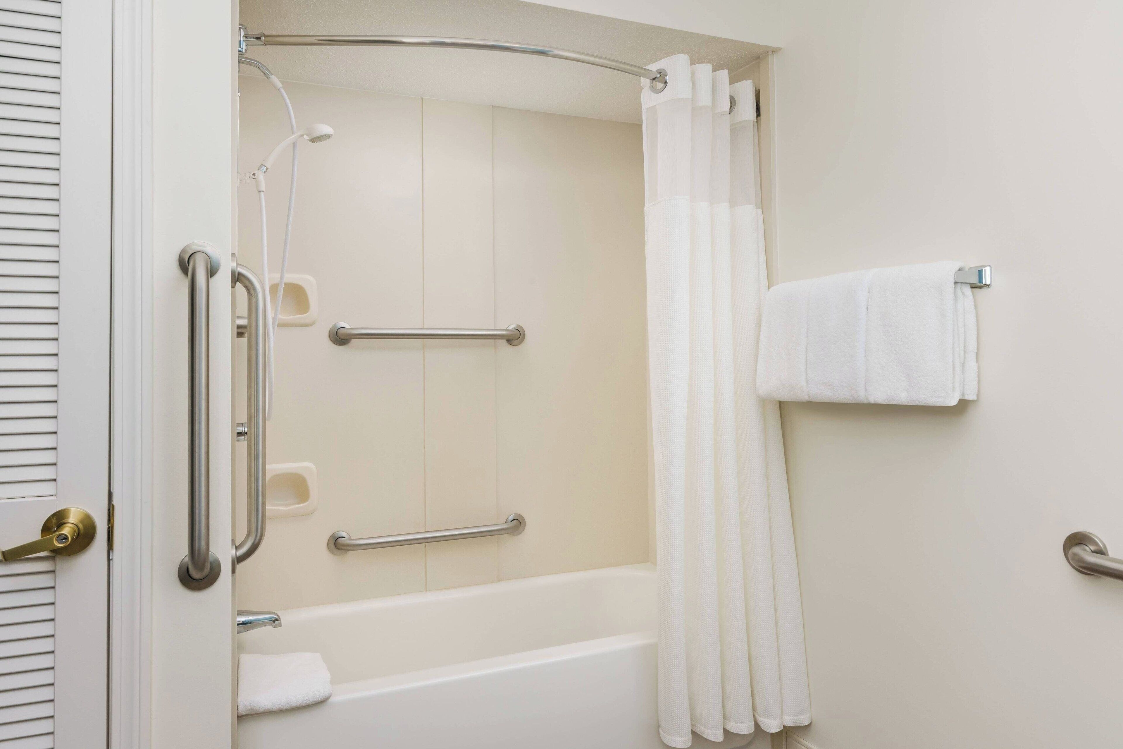 combined shower/bathtub, free toiletries, hair dryer, towels