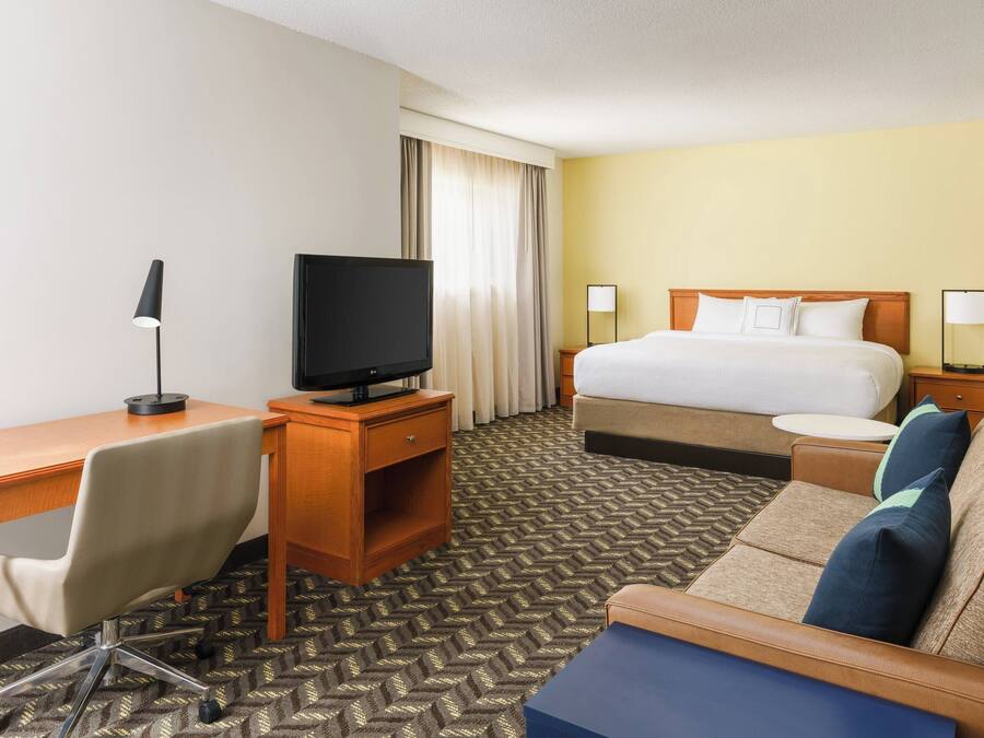 Premium bedding, desk, blackout drapes, iron/ironing board