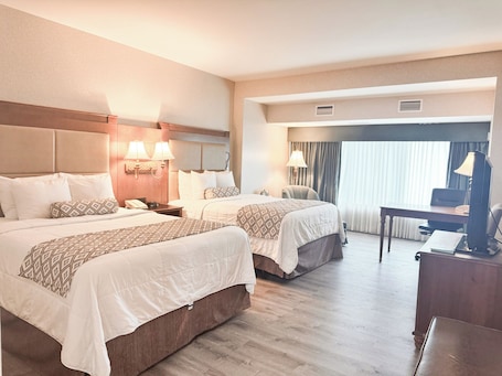 Premium bedding, pillowtop beds, in-room safe, desk. Clayton Plaza Hotel & Extended Stay