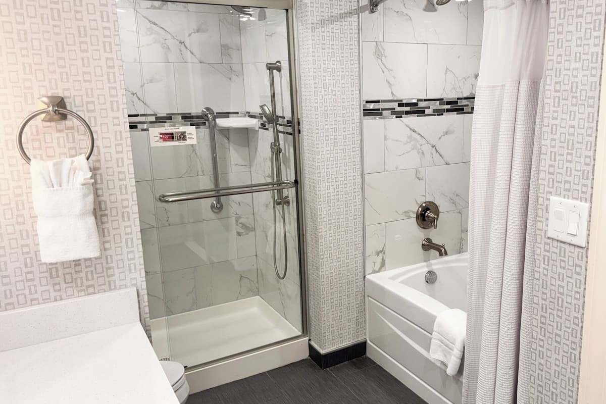 standard suite, 1 bedroom | bathroom | hair dryer, towels
