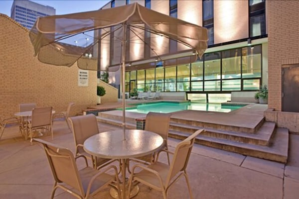 Indoor pool, a heated pool, open 10:00 AM to 10:00 PM, pool loungers