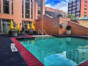 Indoor pool, a heated pool, open 10:00 AM to 10:00 PM, pool loungers