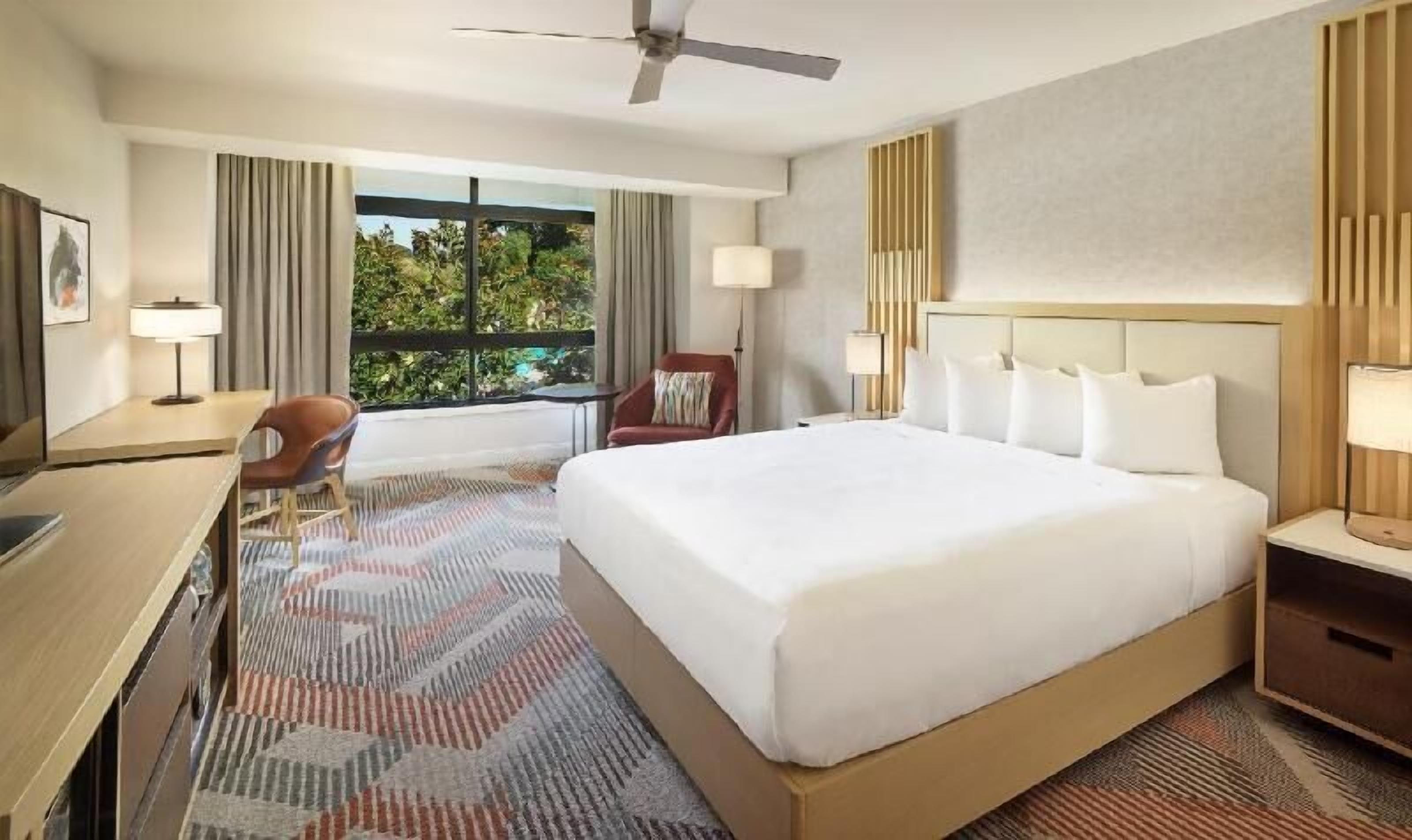 Premium bedding, down comforters, pillowtop beds, in-room safe
