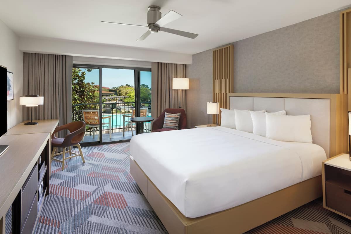 Room, 1 King Bed, Balcony, Pool View | Premium bedding, down comforters, pillowtop beds, in-room safe