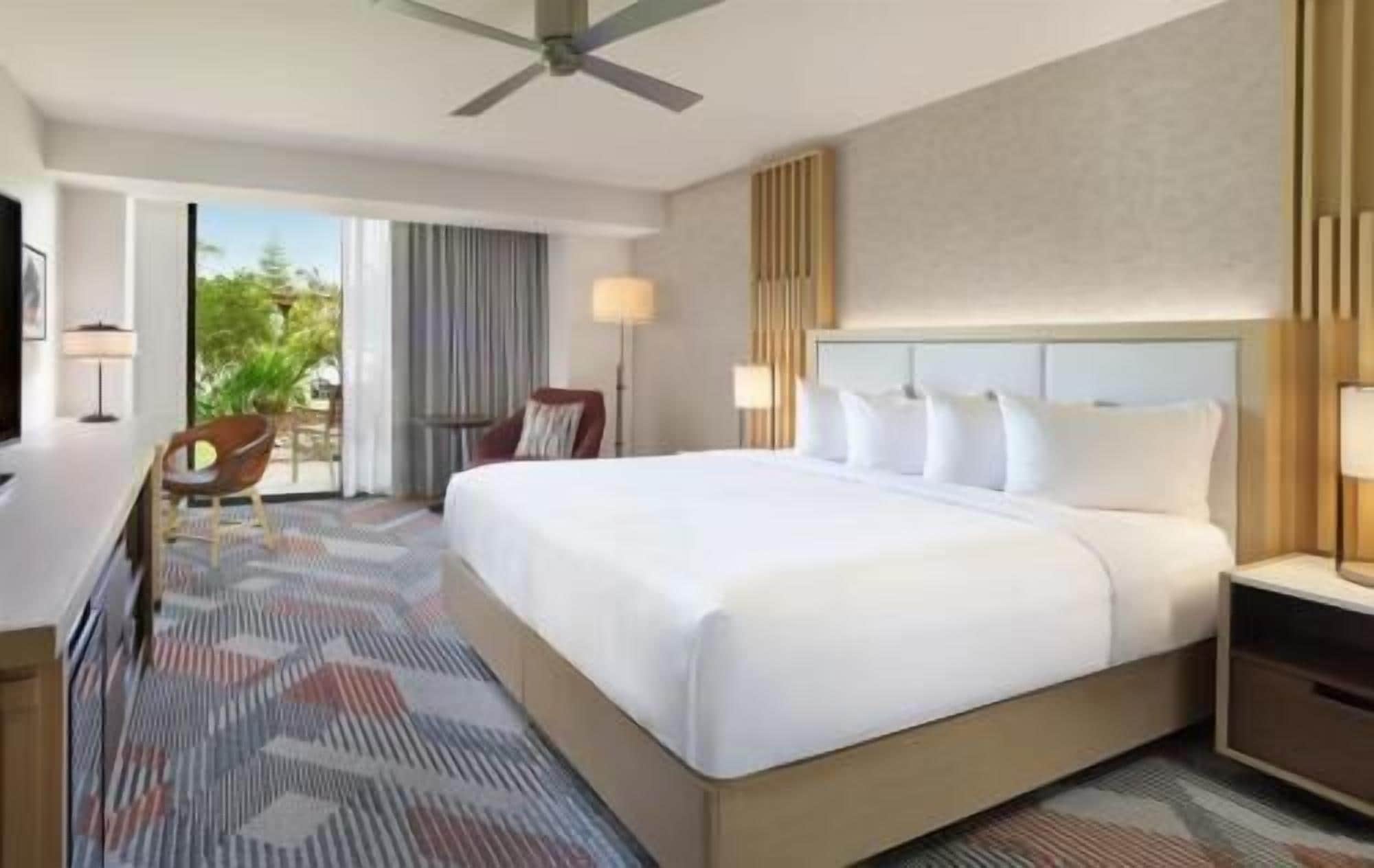 Premium bedding, down comforters, pillowtop beds, in-room safe