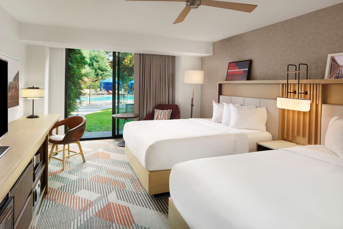 Premium bedding, down comforters, pillowtop beds, in-room safe