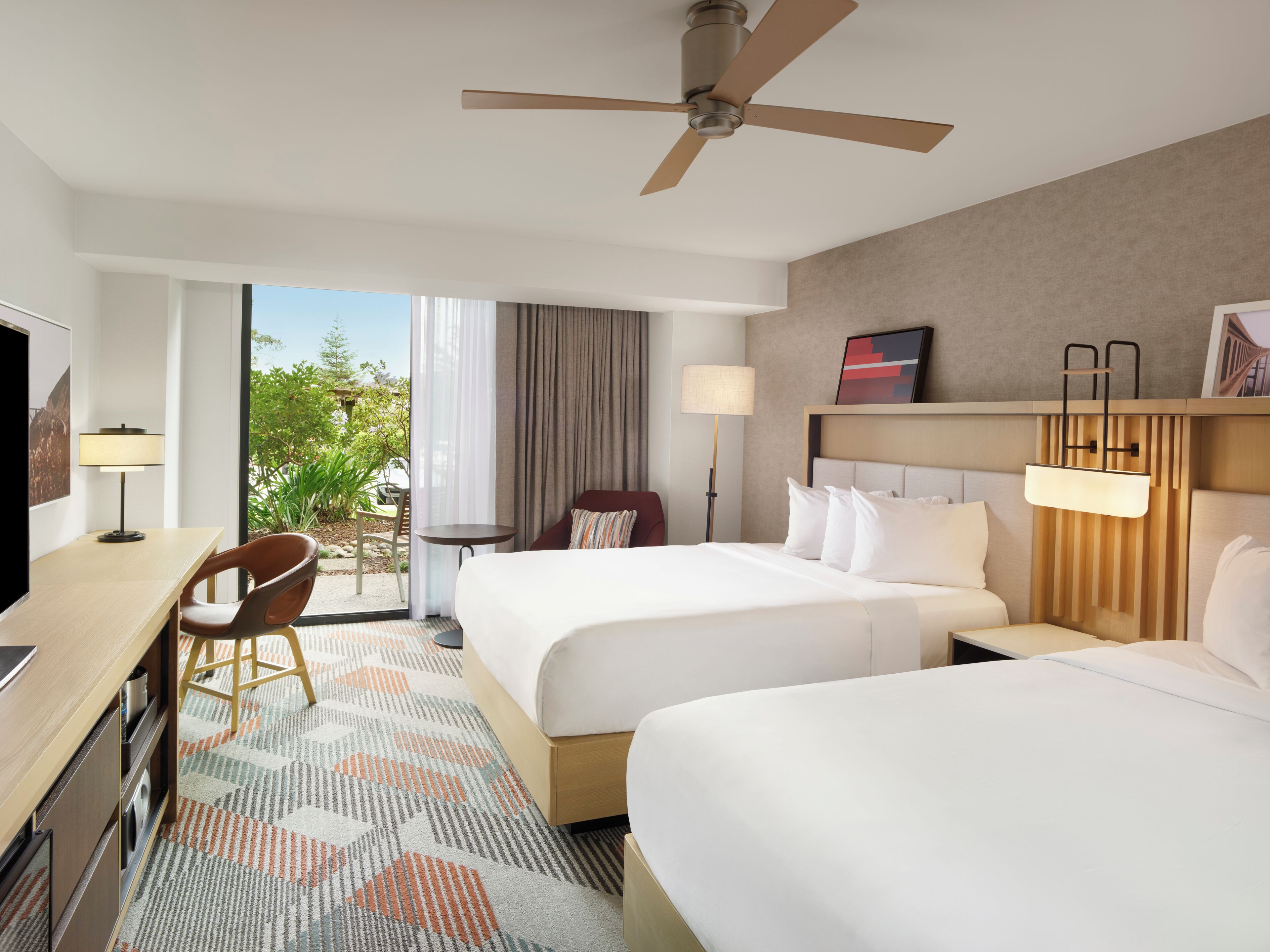 Room, 2 Queen Beds, Patio | Premium bedding, down comforters, pillowtop beds, in-room safe
