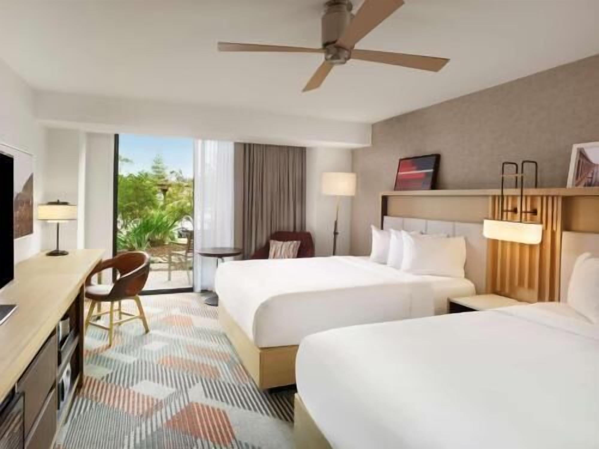 Premium bedding, down comforters, pillowtop beds, in-room safe