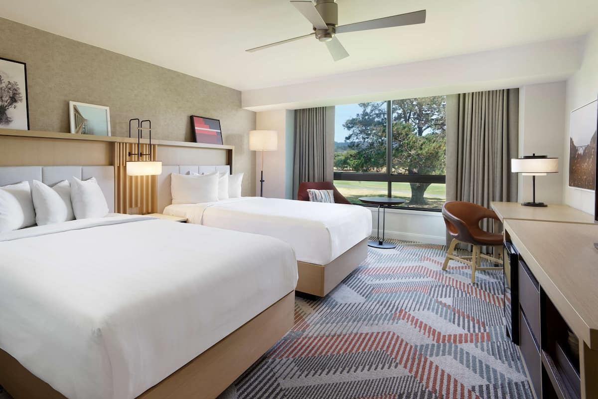 Premium bedding, down comforters, pillowtop beds, in-room safe