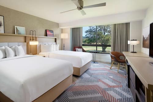 Premium bedding, down comforters, pillowtop beds, in-room safe