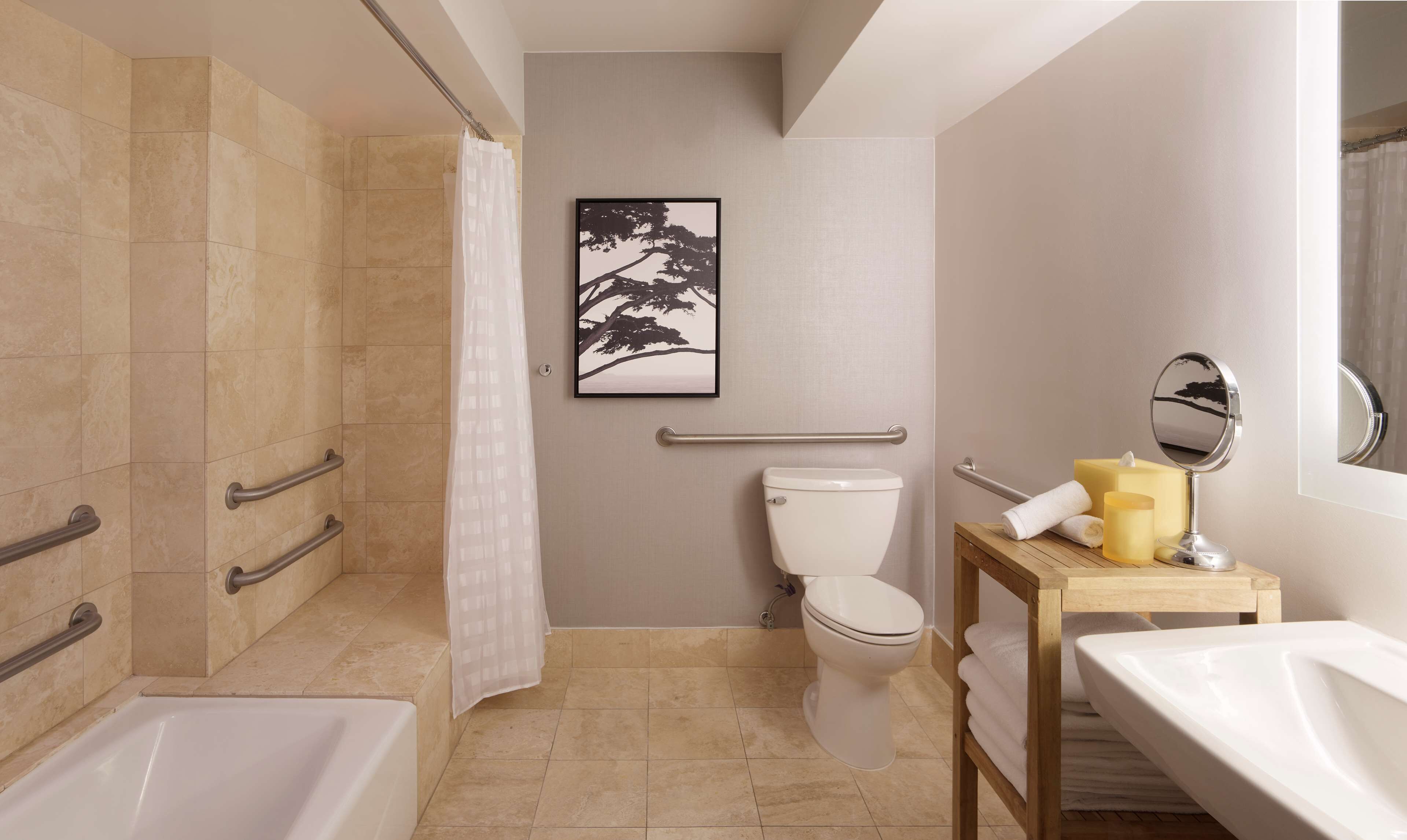 designer toiletries, hair dryer, bathrobes, slippers