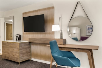 Desk, laptop workspace, blackout drapes, iron/ironing board at Crowne Plaza Orlando - Lake Buena Vista  by IHG