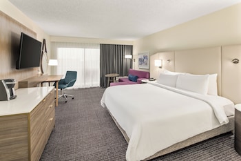 Desk, laptop workspace, blackout drapes, iron/ironing board at Crowne Plaza Orlando - Lake Buena Vista , an IHG Hotel