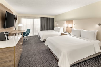 Desk, laptop workspace, blackout drapes, iron/ironing board at Crowne Plaza Orlando - Lake Buena Vista , an IHG Hotel