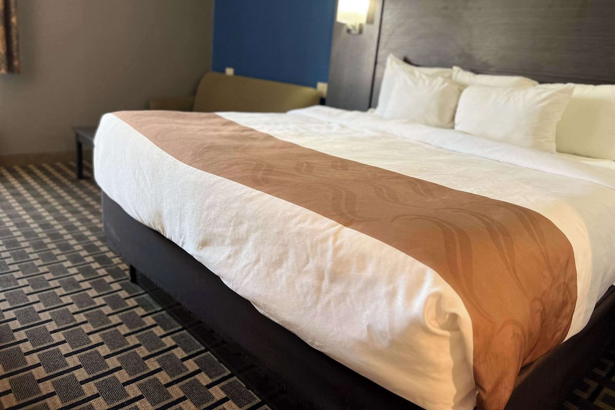 Suite, 1 King Bed, Non Smoking | Desk, laptop workspace, iron/ironing board, cribs/infant beds