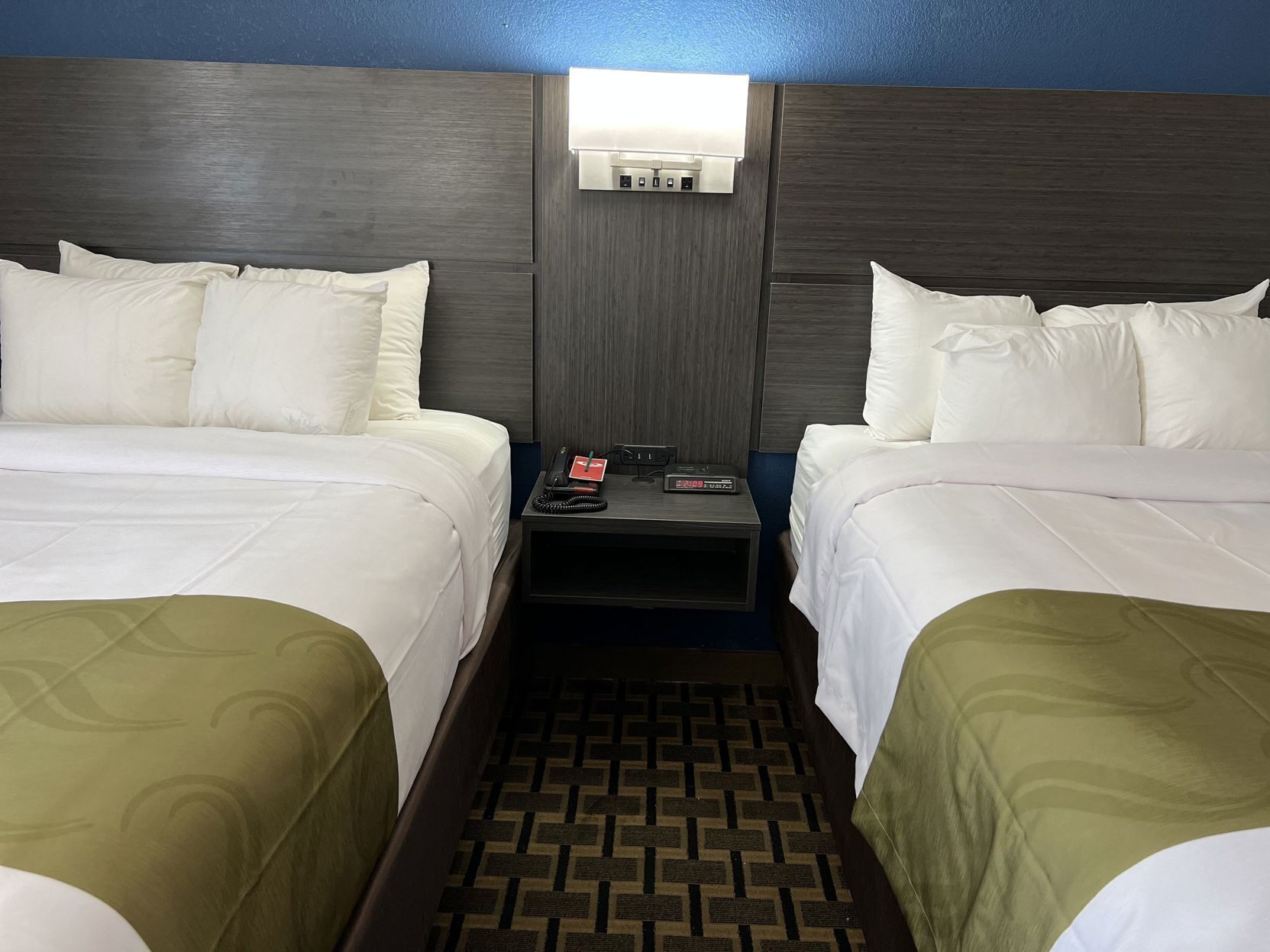 Desk, laptop workspace, iron/ironing board, cots/infant beds