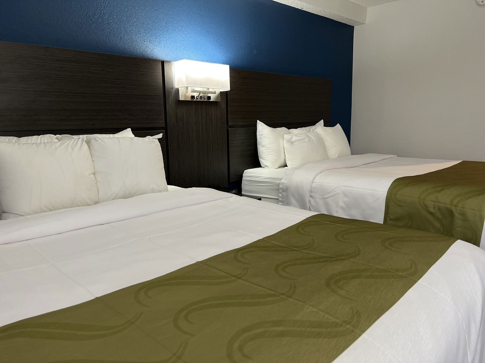 Desk, laptop workspace, iron/ironing board, cots/infant beds