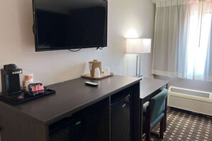 Desk, laptop workspace, iron/ironing board, cribs/infant beds