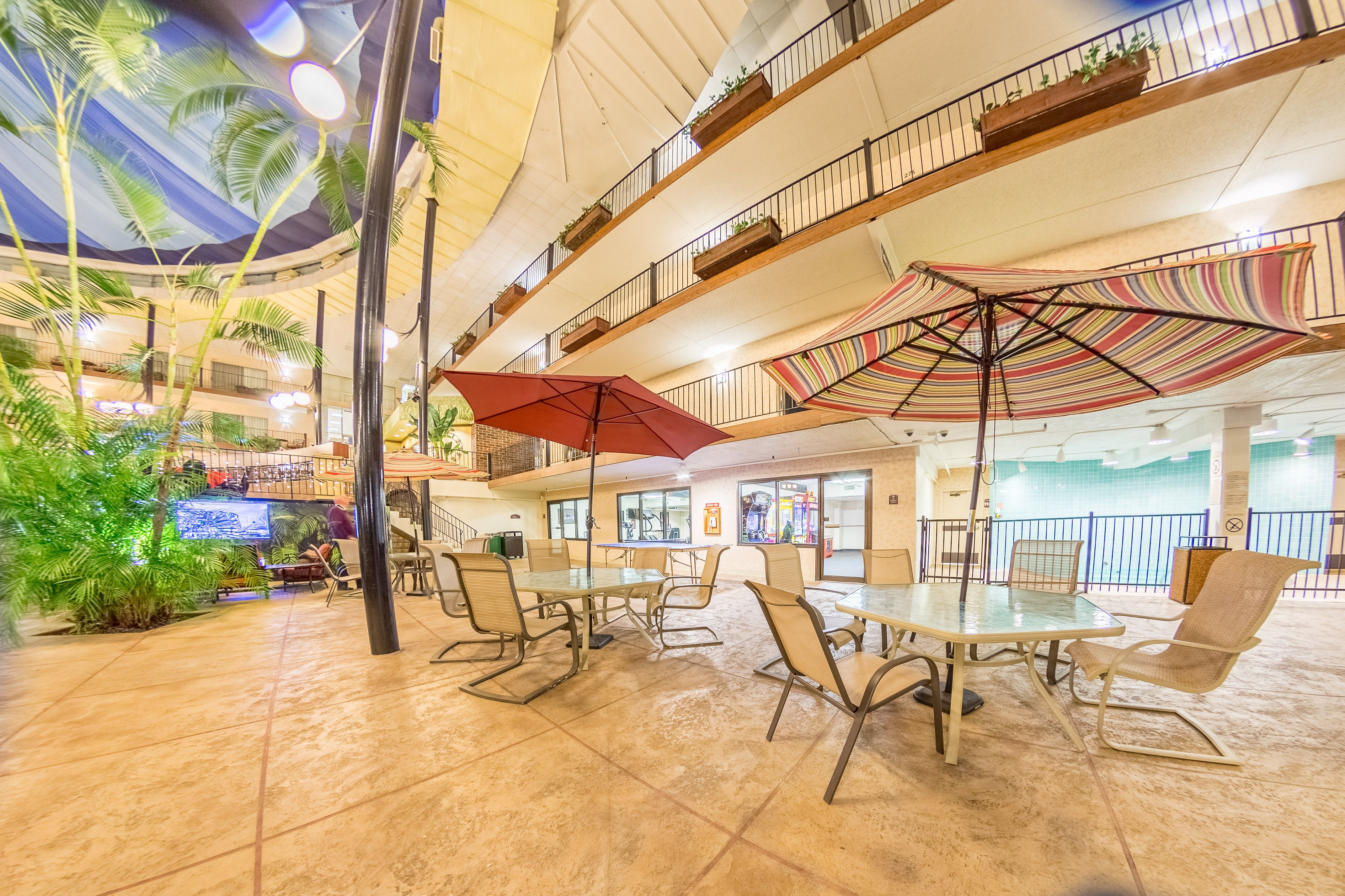 indoor pool, open 8:00 am to 10:00 pm, pool umbrellas, pool loungers