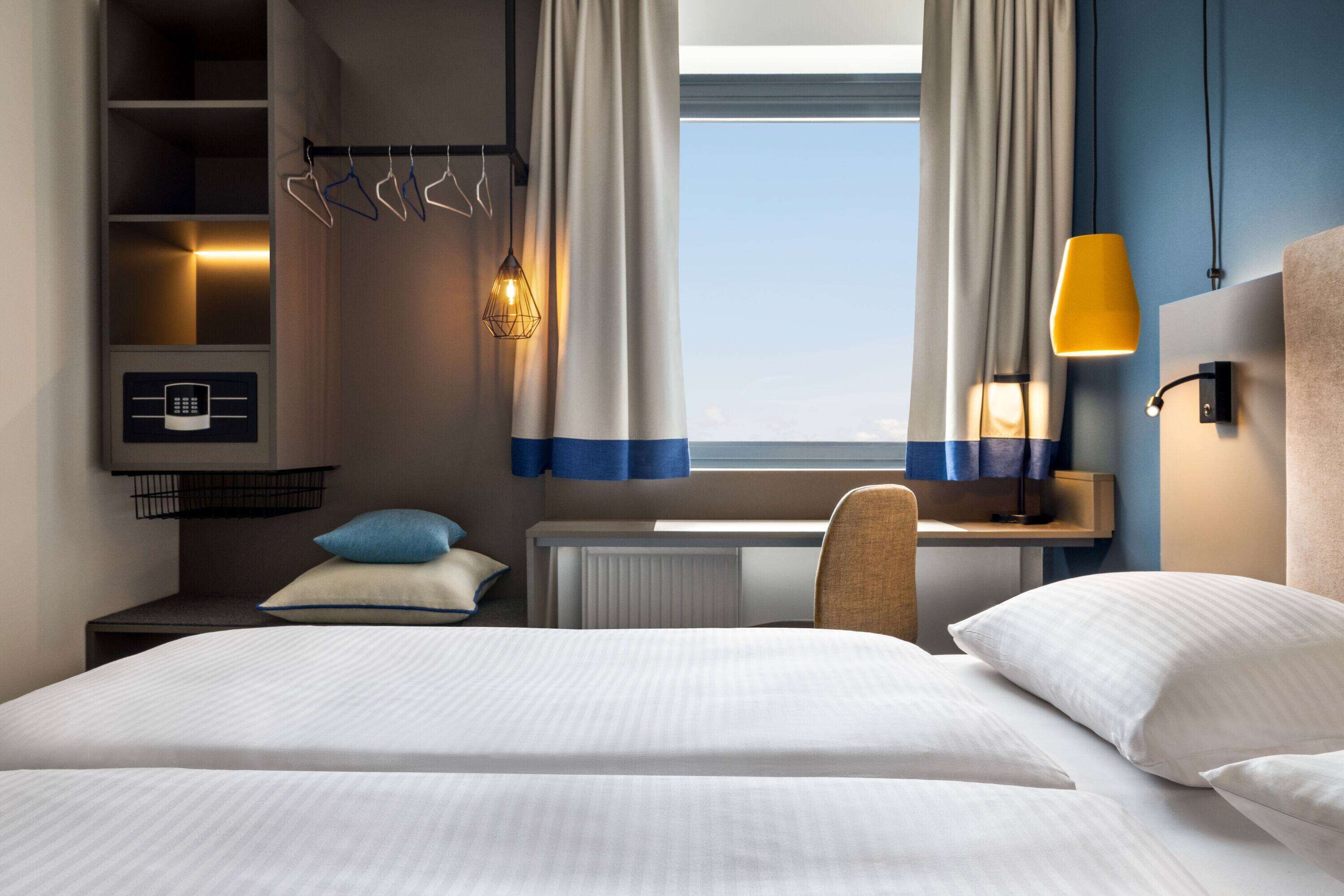 junior suite | in-room safe, desk, blackout curtains, soundproofing