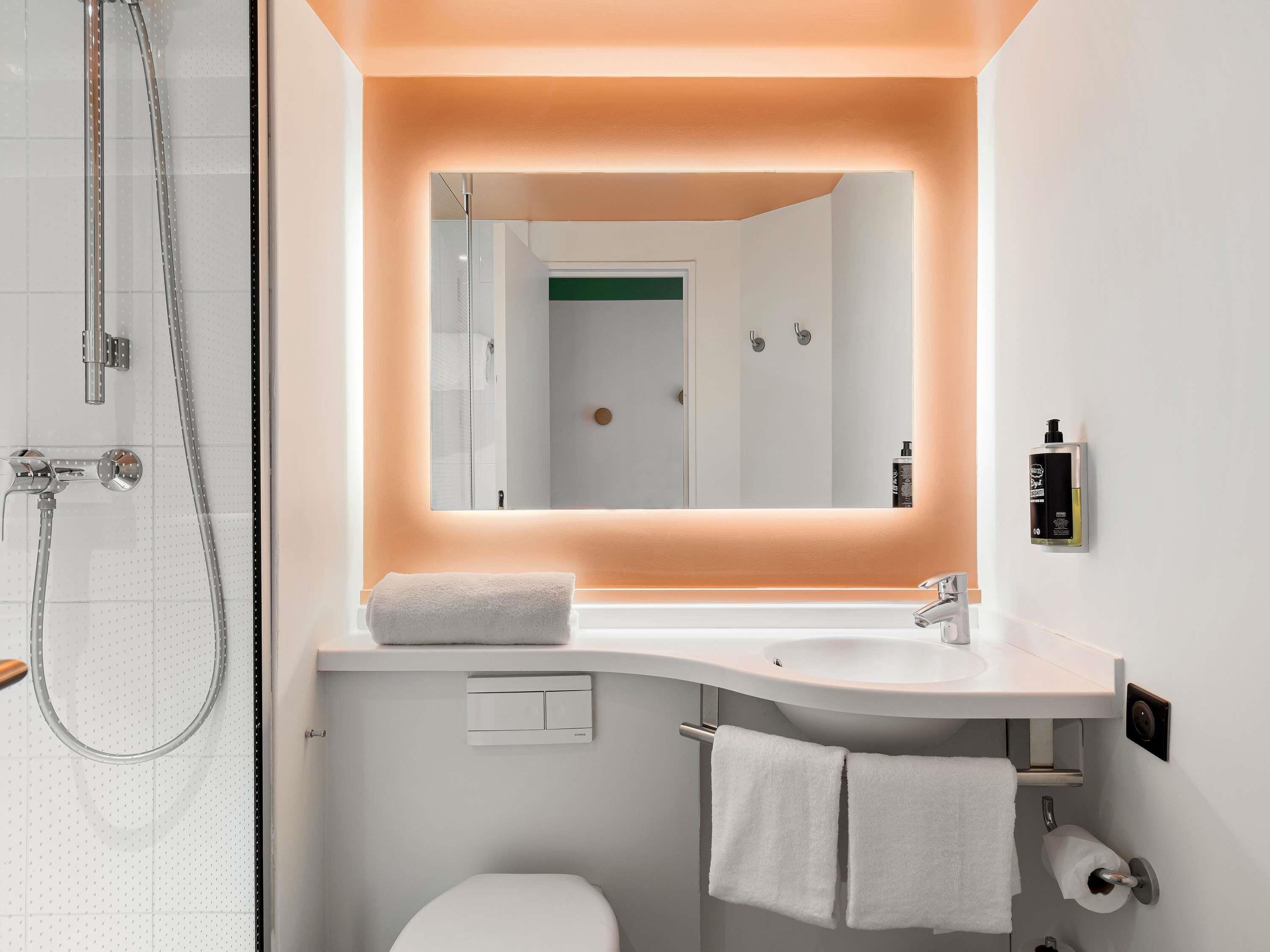 hypo-allergenic bedding, desk, laptop workspace, blackout curtains