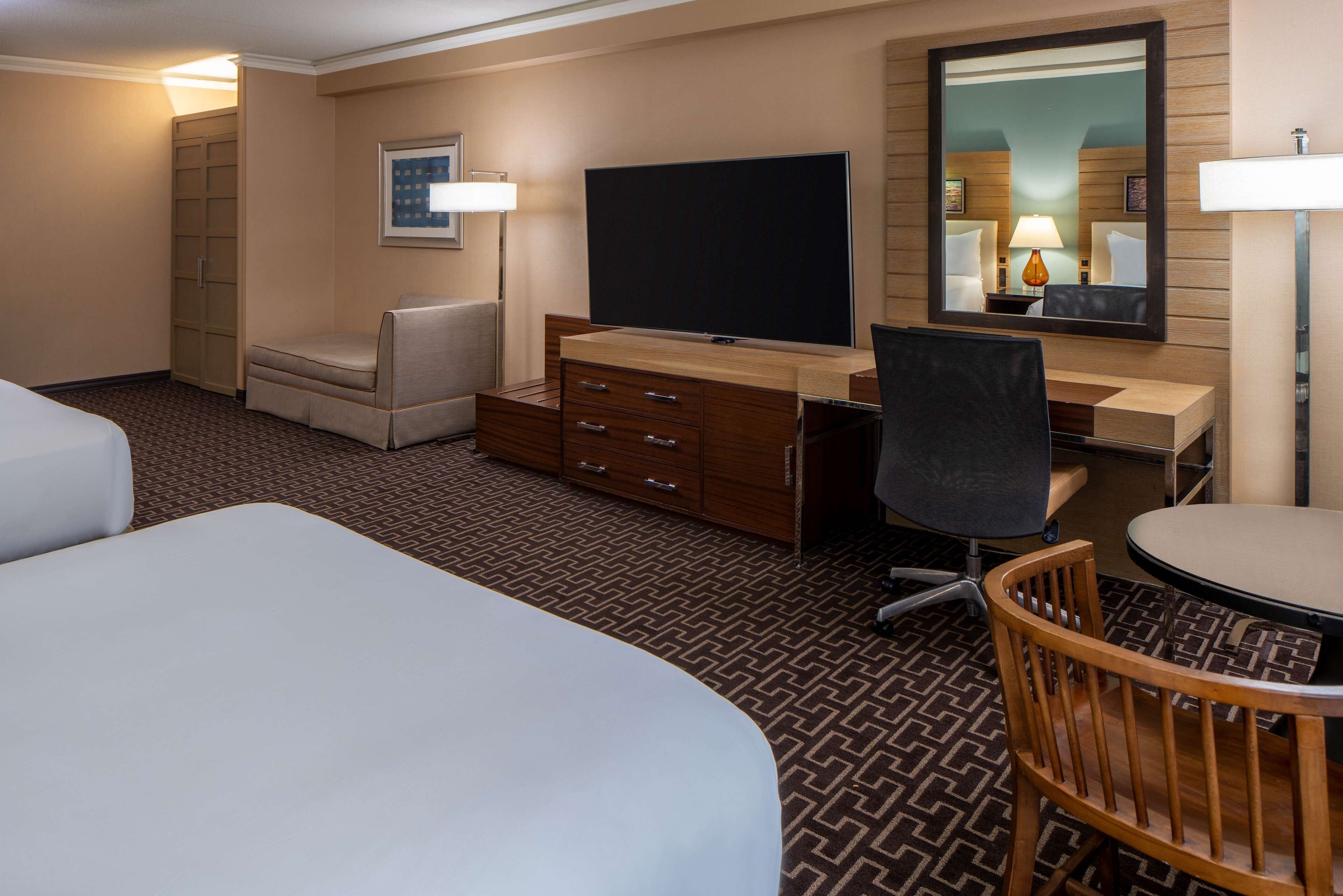 Premium bedding, down duvets, in-room safe, desk