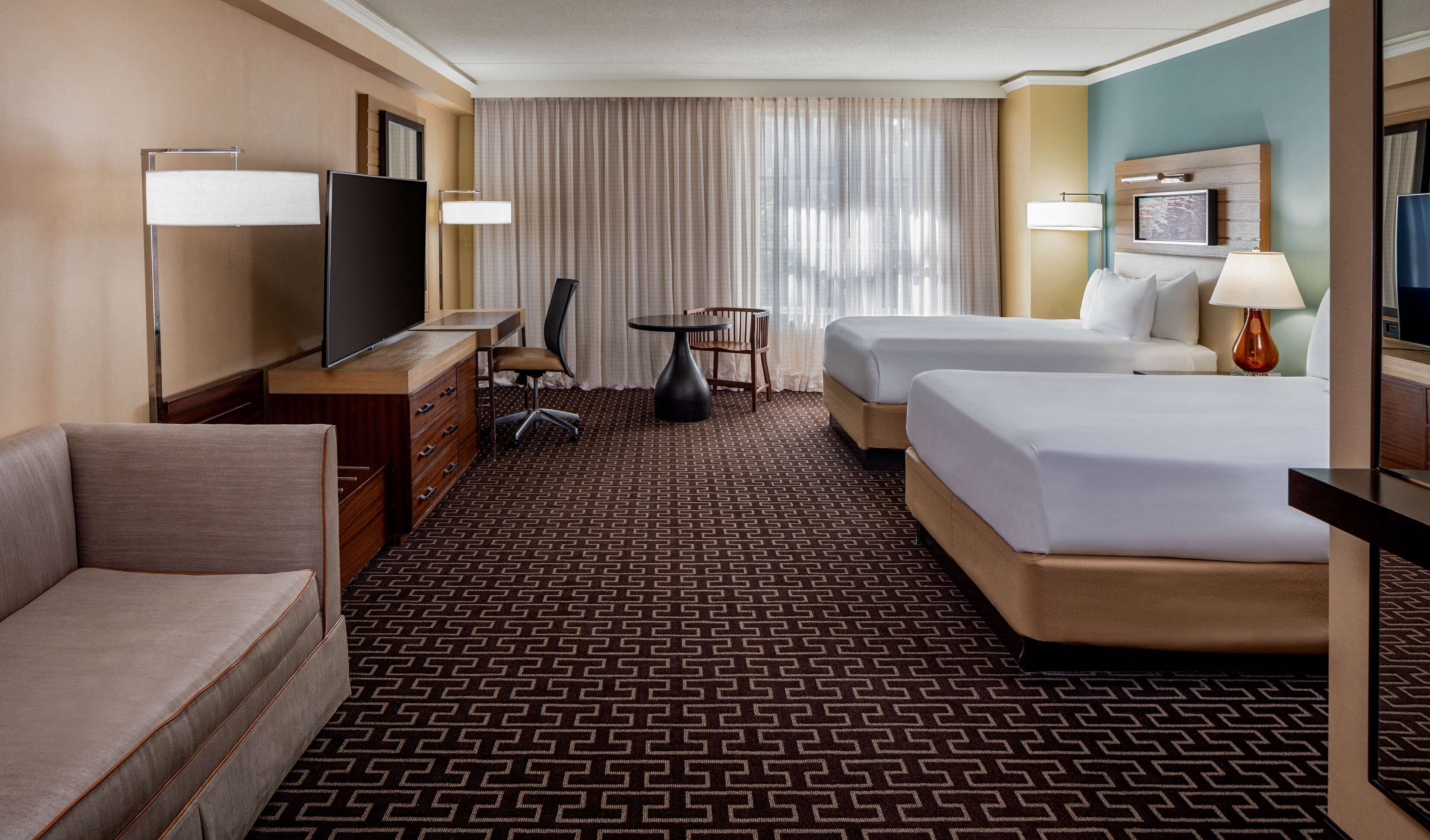 Premium bedding, down duvets, in-room safe, desk