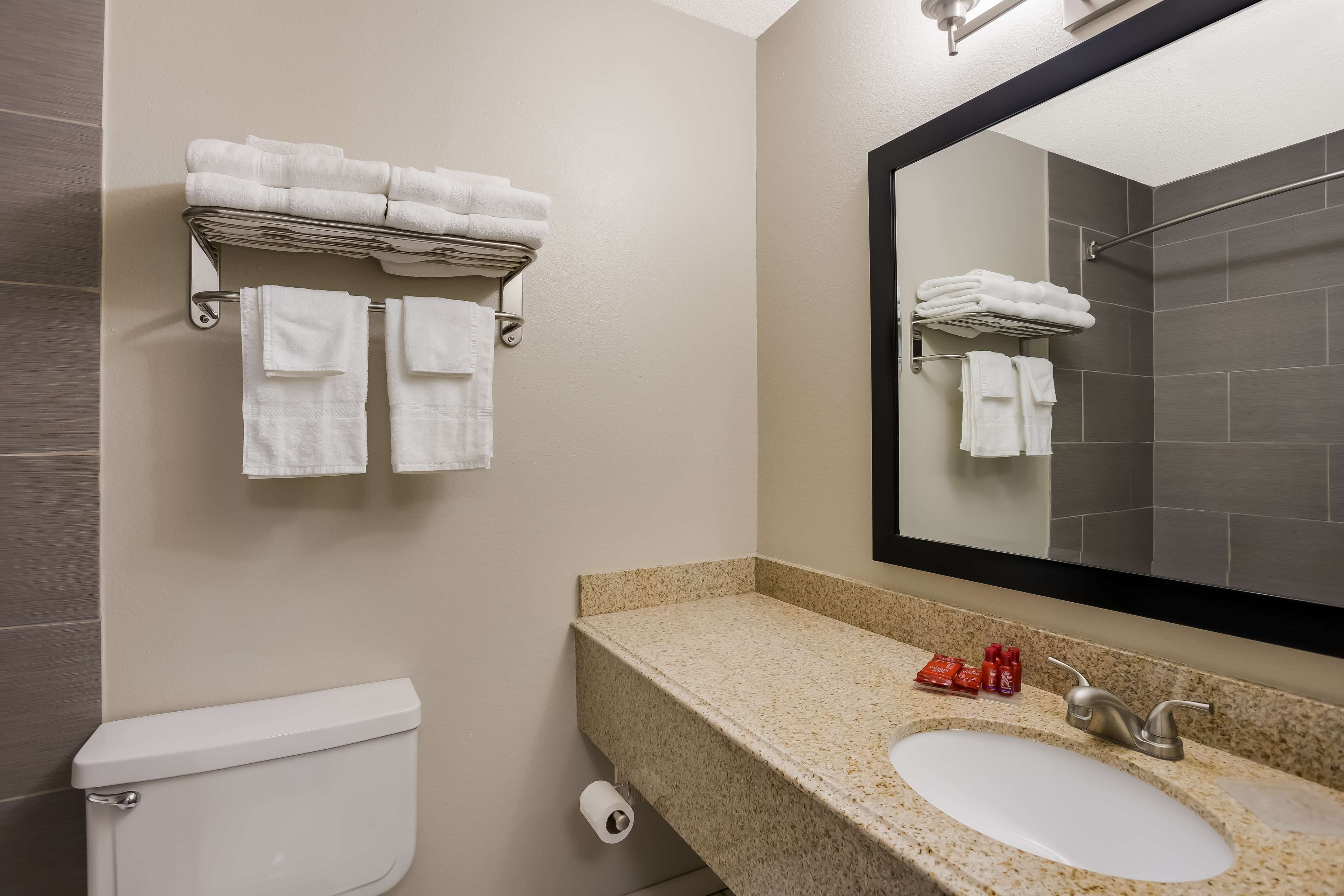 standard room, 2 queen beds, non smoking, refrigerator & microwave | bathroom | shower, hair dryer, towels
