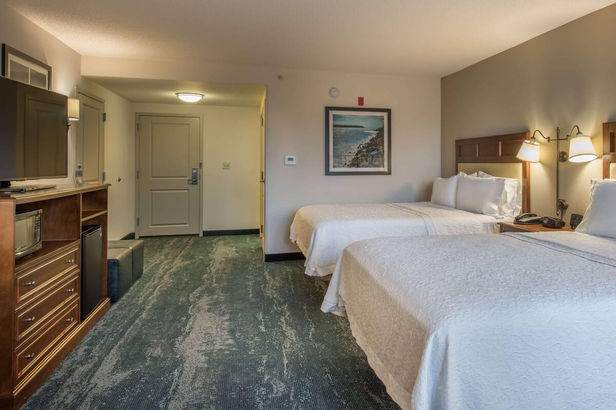 In-room safe, desk, iron/ironing board, cribs (free)