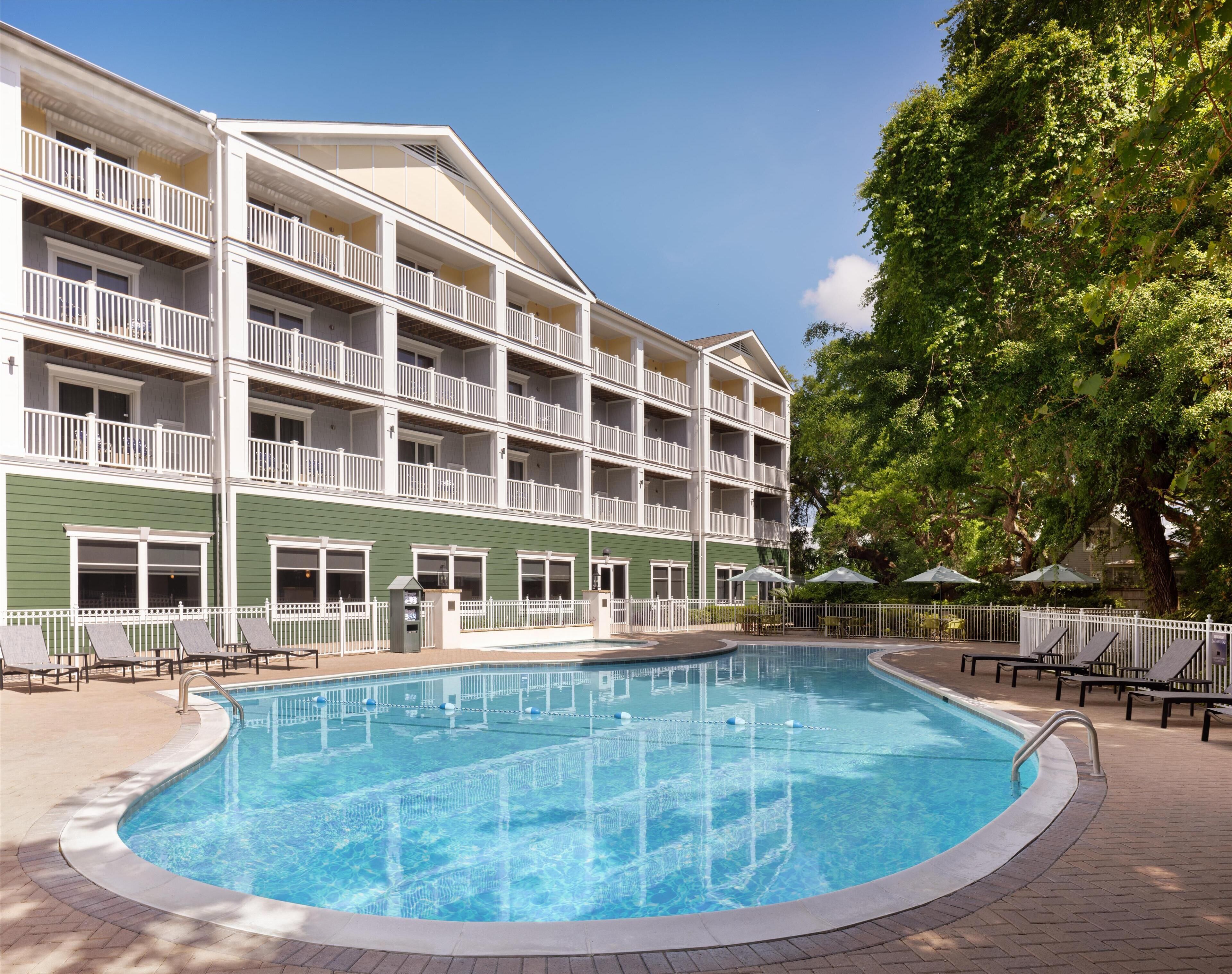 Outdoor pool, a heated pool, open 9:00 AM to 10:00 PM, sun loungers