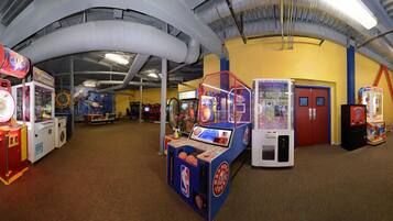 Play classic arcade games in this vibrant entertainment space.