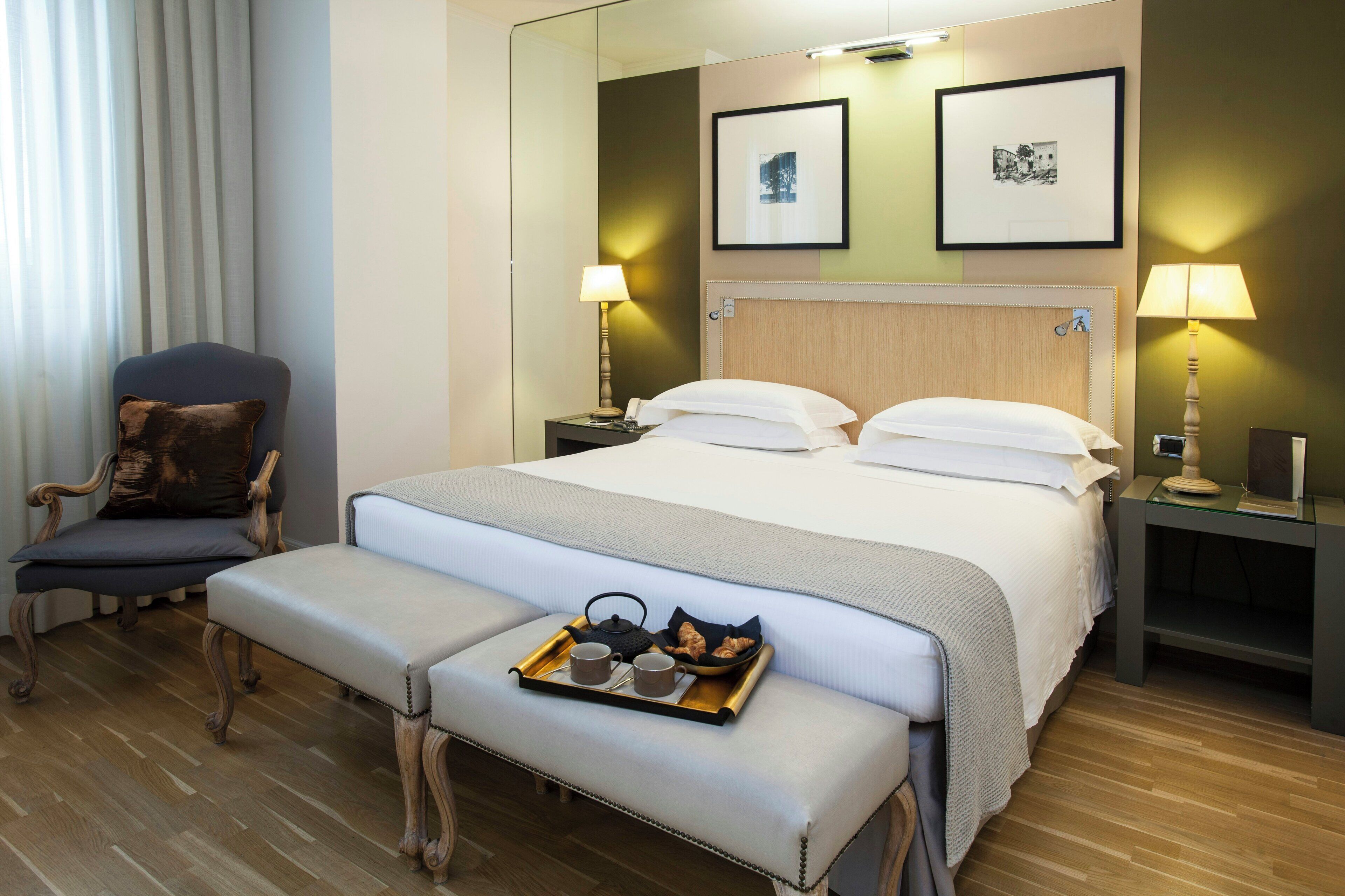 deluxe room | premium bedding, minibar, in-room safe, desk