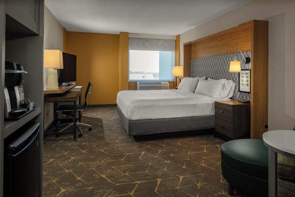 Premium kamer, 1 kingsize bed, op de hoek | Luxe beddengoed, een bureau, een laptopwerkplek