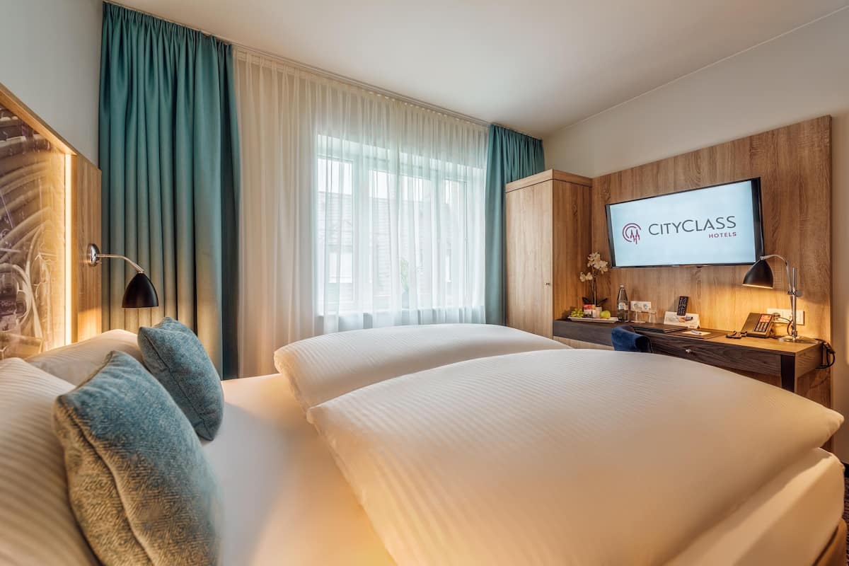 Habitación doble Confort | Ropa de cama hipoalergénica y minibar 
