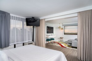 Bay View King Suite | Living area | 50-inch flat-screen TV with satellite channels, TV - The Rambler Hotel (Chula Vista)