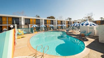 Outdoor pool, a heated pool, open 9:00 AM to 9:00 PM, sun loungers