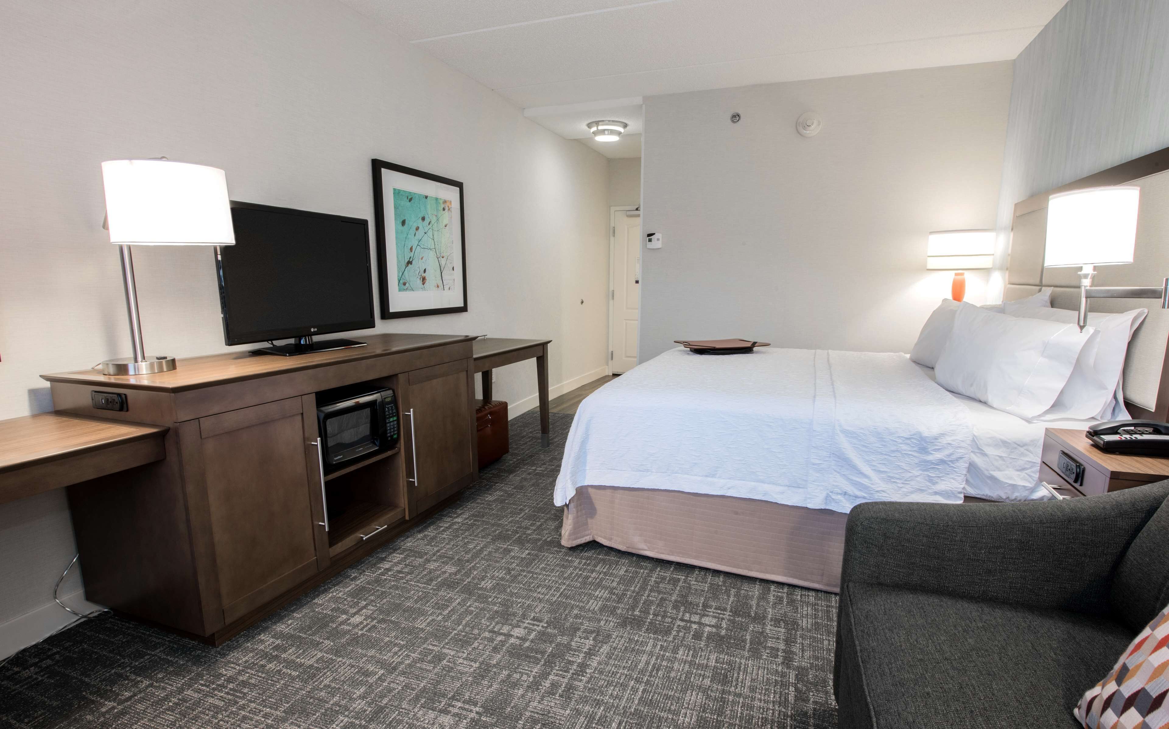 room, 1 king bed with sofa bed | in-room safe, desk, laptop workspace, blackout curtains