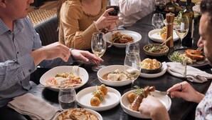 A dining table with various dishes and wine glasses. - The Victoria Hotel Melbourne (Melbourne)
