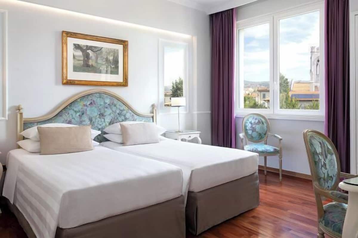 Ropa de cama de alta calidad y minibar