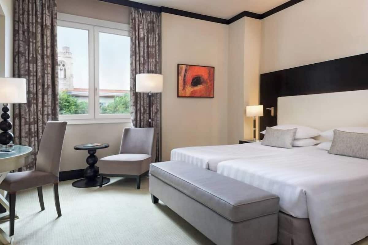 Ropa de cama de alta calidad y minibar