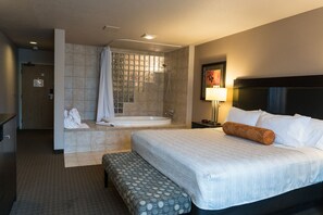 Suite, 1 King Bed | Bathroom | Combined shower/tub, free toiletries, hair dryer, towels