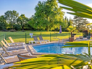 Indoor pool, outdoor pool, open 7:00 AM to 9:30 PM, pool loungers