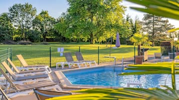 Indoor pool, outdoor pool, open 7:00 AM to 9:30 PM, pool loungers