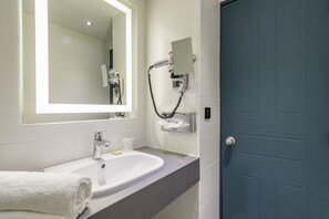Eco-friendly toiletries, hair dryer, towels