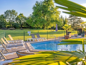 Indoor pool, outdoor pool, open 7:00 AM to 9:30 PM, pool loungers