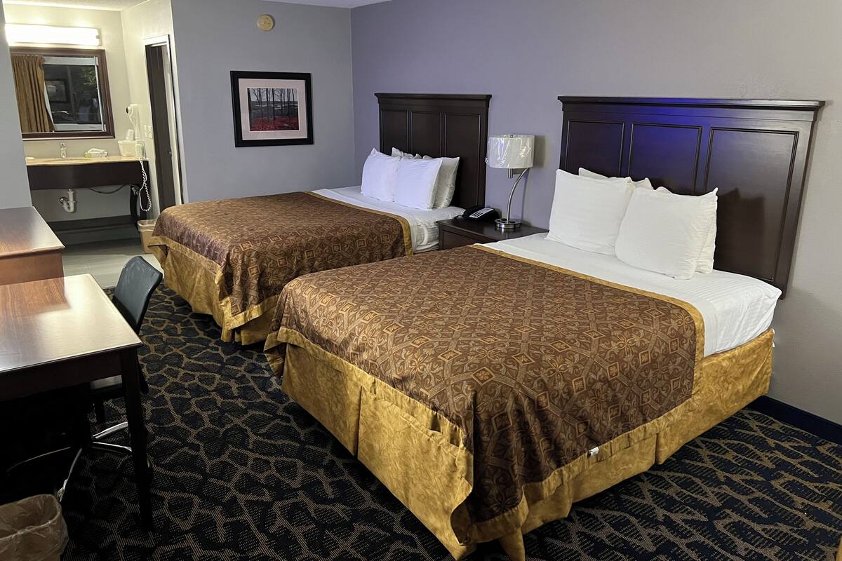 1 bedroom, pillow-top beds, individually furnished, desk