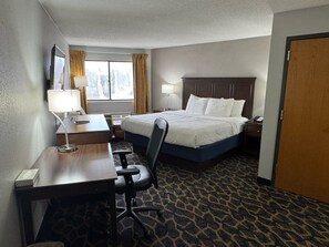 Deluxe Room, 1 King Bed | 1 bedroom, pillow-top beds, individually furnished, desk